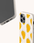 Mangoes biodegradable phone case displayed on Samsung Galaxy S24 with colourful fruit pattern and sustainable matte surface.