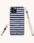 Close-up of Navy Stripes eco-friendly phone case on iPhone 15 showing minimalist striped design and smooth matte texture.