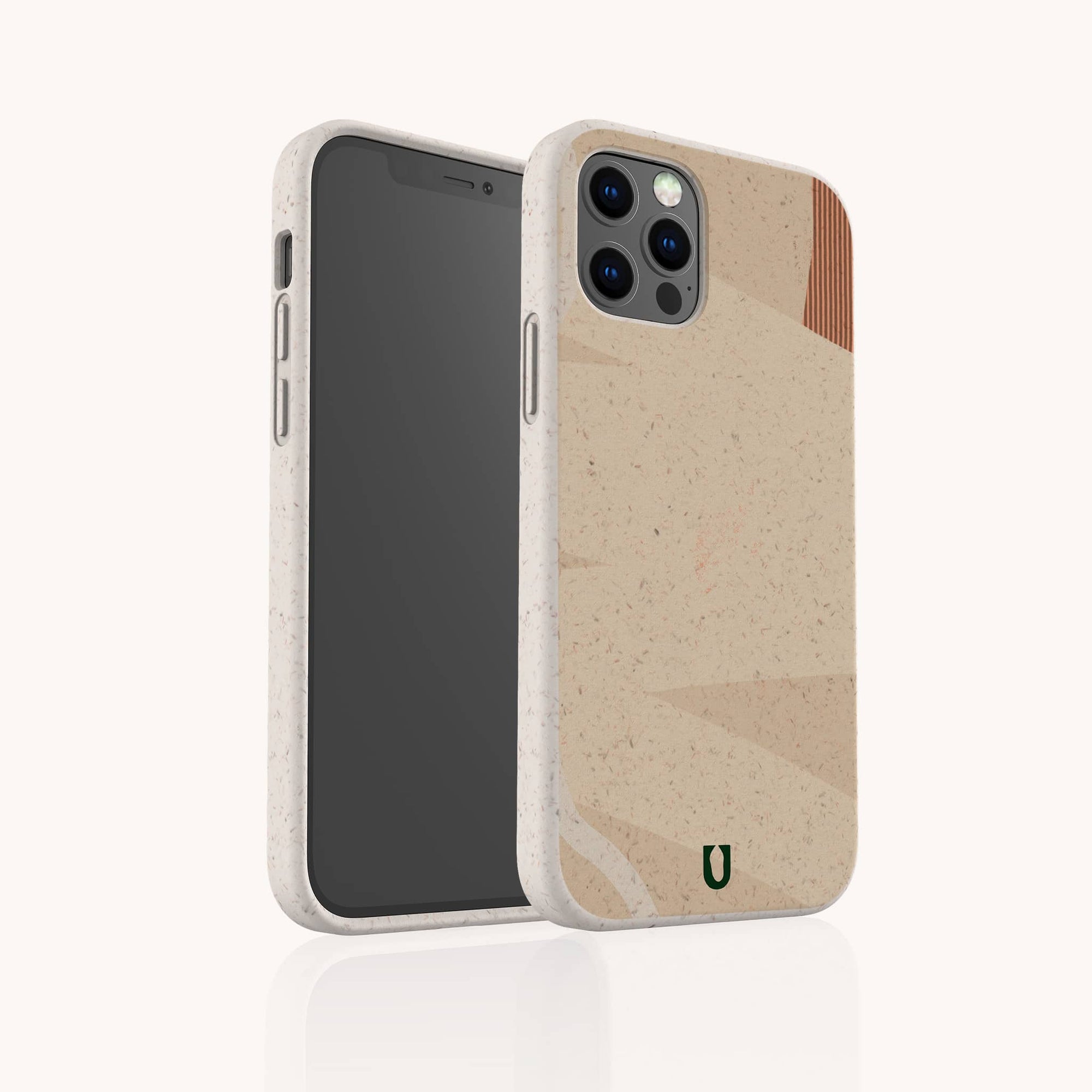 A smartphone with the Peachy Abstract Lines Biodegradable Phone Case, which is speckled beige and features a subtle geometric design along with a small green logo. This eco-friendly case includes cutouts for the camera and buttons, while the screen remains dark and reflects minimal light.