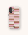 Rose Bar Stripe Eco-Friendly Biodegradable Phone Case with a wireless charging compatible, split-screen design featuring horizontal pink and brown stripes against a speckled background.