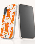 Two smartphones with white cases are displayed on a white background; one showcases the Tigers Eco-Friendly Biodegradable Phone Case, featuring a lively orange tiger pattern, while the other has a blank black screen. These cases combine a speckled texture and rounded edges for stylish appeal, all crafted from sustainable materials.