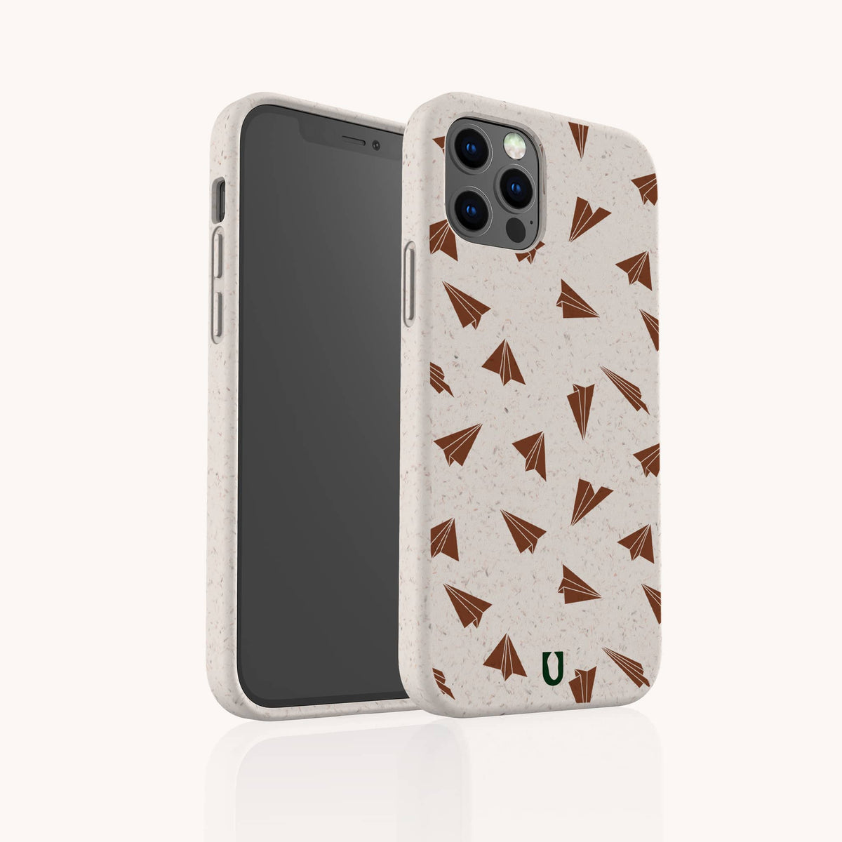 Two Paper Planes Eco-Friendly Biodegradable Phone Cases are displayed with a beige background and brown paper airplane pattern—one shows the back design, while the other reveals the front with a smartphone inside. These cases combine stylish protection with environmentally conscious materials to help reduce your ecological impact.