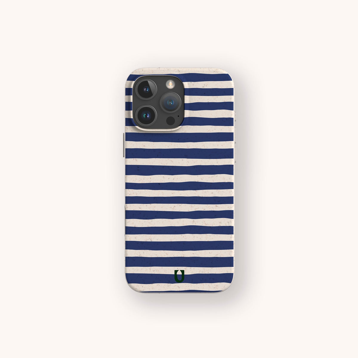 A smartphone with a Navy Stripes Eco-Friendly Biodegradable Phone Case, featuring navy blue and white horizontal stripes and a small green horseshoe-shaped logo at the bottom center.