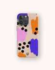 A Memphis Eco-Friendly Biodegradable Phone Case featuring a colorful Memphis design with abstract orange, purple, and pink shapes, plus scattered black dots on a beige background.