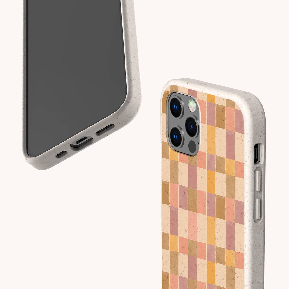 Two beige phone cases, one showing the front and one the back. The back features a pink and purple watercolour design. Both cases have precise cutouts for the camera, buttons, and ports, making this Pink and Purple Watercolour Eco-Friendly Phone Case a stylish and sustainable choice.