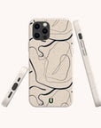 Here are four views of the Abstract Swirling Lines Eco-Friendly Phone Case, shown in beige with bold abstract black swirling lines and a small green logo at the bottom. The case is displayed from the back, both sides, and a front angle on a plain background, and is compatible with both iPhone and Samsung Galaxy models.
