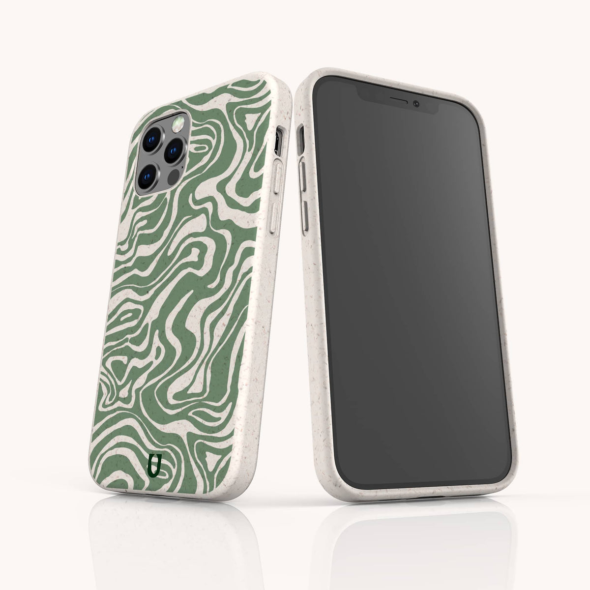 Two smartphones in white cases are displayed. One phone stands out with the Green Marble Swirl Eco-Friendly Phone Case, showcasing its abstract wavy green marble design, while the other phone displays its black screen. Both phones rest on a glossy white surface.
