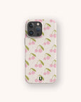 The Pink Cherries Eco-Friendly Biodegradable Phone Case features a charming pattern of pink cherries with green leaves on a light beige background and includes a small, black logo near the bottom.
