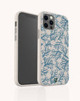 A smartphone showcased against a plain white background, fitted with the Blue Coral Eco-Friendly Phone Case, which features a marine-inspired blue coral reef pattern on a beige backdrop. The phone’s screen is turned off, and the camera lenses remain visible.