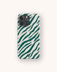 The Green Zebra Stripes Eco-Friendly Phone Case, featuring bold green and white zebra stripes, is displayed on a smartphone against a light background. The case provides a stylish yet sustainable look, with the cameras visible in the upper left corner.