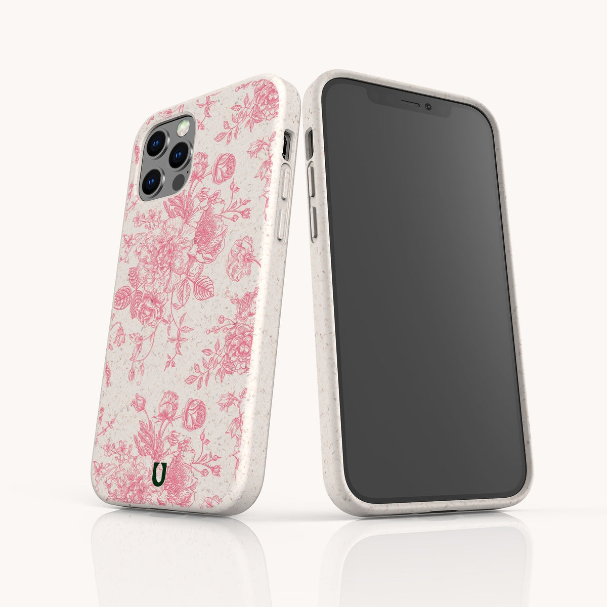 Two smartphones in Pink Roses Eco-Friendly Phone Cases featuring a white background with pink rose patterns. One phone displays the back of the case with its camera, while the other shows the blank screen. Both eco-friendly cases have a subtle speckled texture.