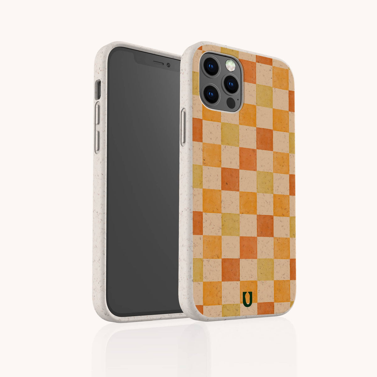 A smartphone in the Brown and Orange Checker Eco-Friendly Phone Case, featuring a speckled, off-white compostable design with an orange and brown checkerboard pattern on the back and a small black and yellow logo at the bottom. This phone case combines playful style with sustainability.