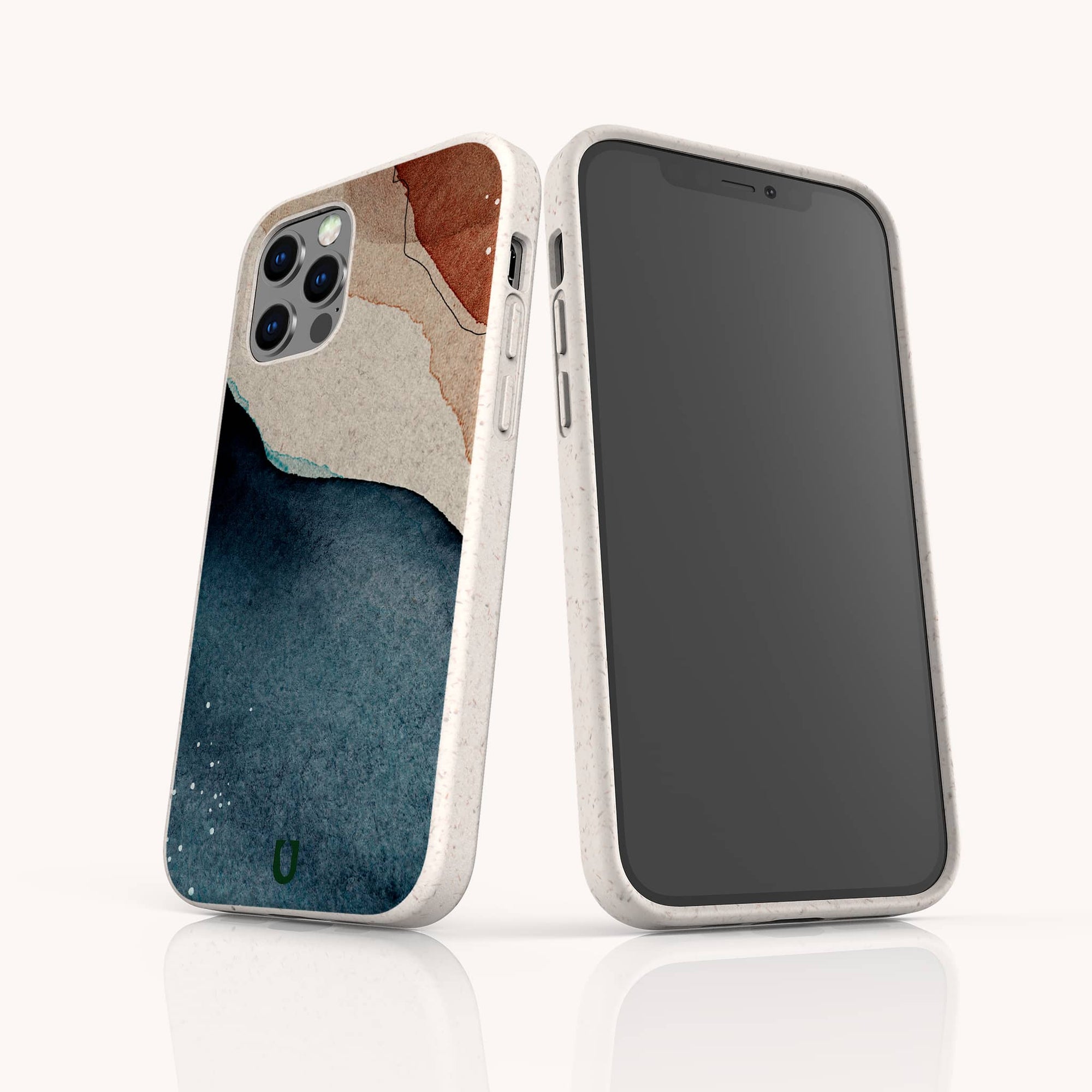 Two smartphones in white Watercolour Landscape Eco-Friendly Phone Cases are shown; one displays the screen, while the other shows the back with blue, beige, and brown abstract watercolor-like shapes made from sustainable materials.