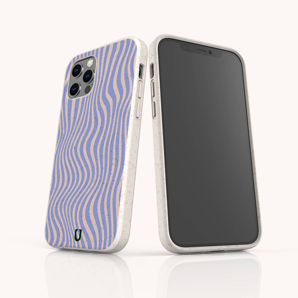 Two smartphones in white cases—one featuring a blank black screen, the other displaying the Blue Distort Lines Eco-Friendly Phone Case with its eye-catching blue and beige wavy striped pattern—stand upright on a white surface. This eco-friendly case is compatible with both iPhone and Samsung devices, combining sustainability with stylish design.