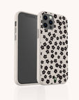 The Little Black Flowers Eco-Friendly Biodegradable Phone Case is a light-colored, sustainable phone cover featuring a delicate pattern of small black flowers. The image shows both the front and back of the case against a plain background.