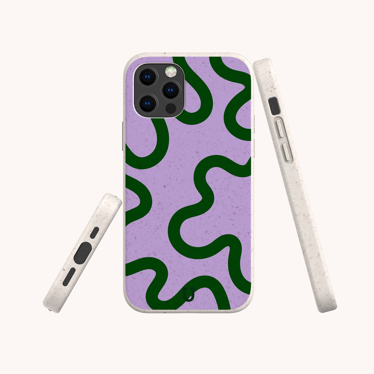 Three white smartphones are displayed at various angles, each fitted with the Purple and Green Swirl Eco-Friendly Biodegradable Phone Case. The off-white cases have a speckled texture and showcase a green wavy abstract pattern set against a purple background. The image is captured on a plain white backdrop.