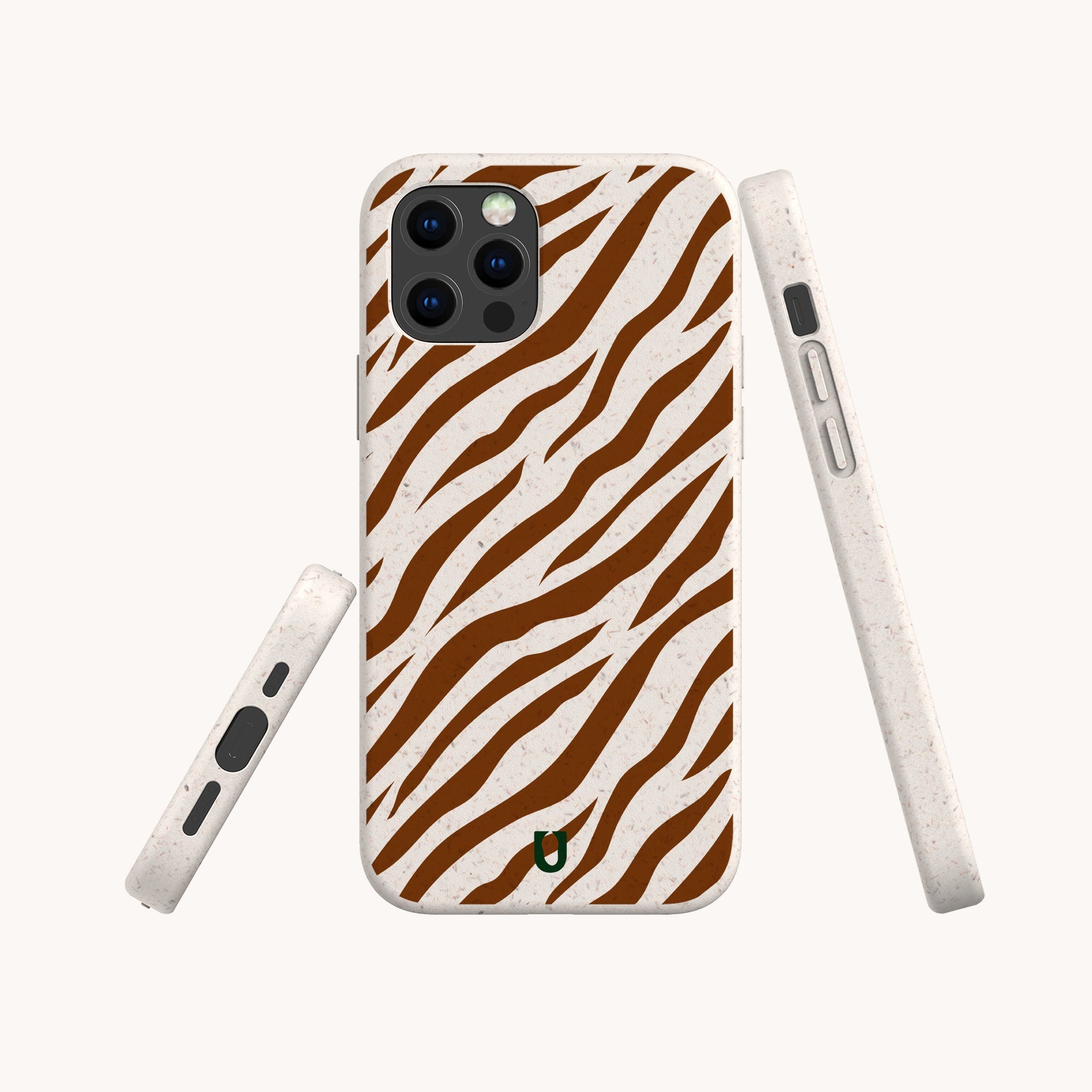 The Brown Zebra Eco-Friendly Phone Case features a brown and white zebra stripe pattern, shown from the back and sides on a plain light background. This biodegradable case fits iPhone and Samsung Galaxy with precise cutouts for buttons, camera, and ports.