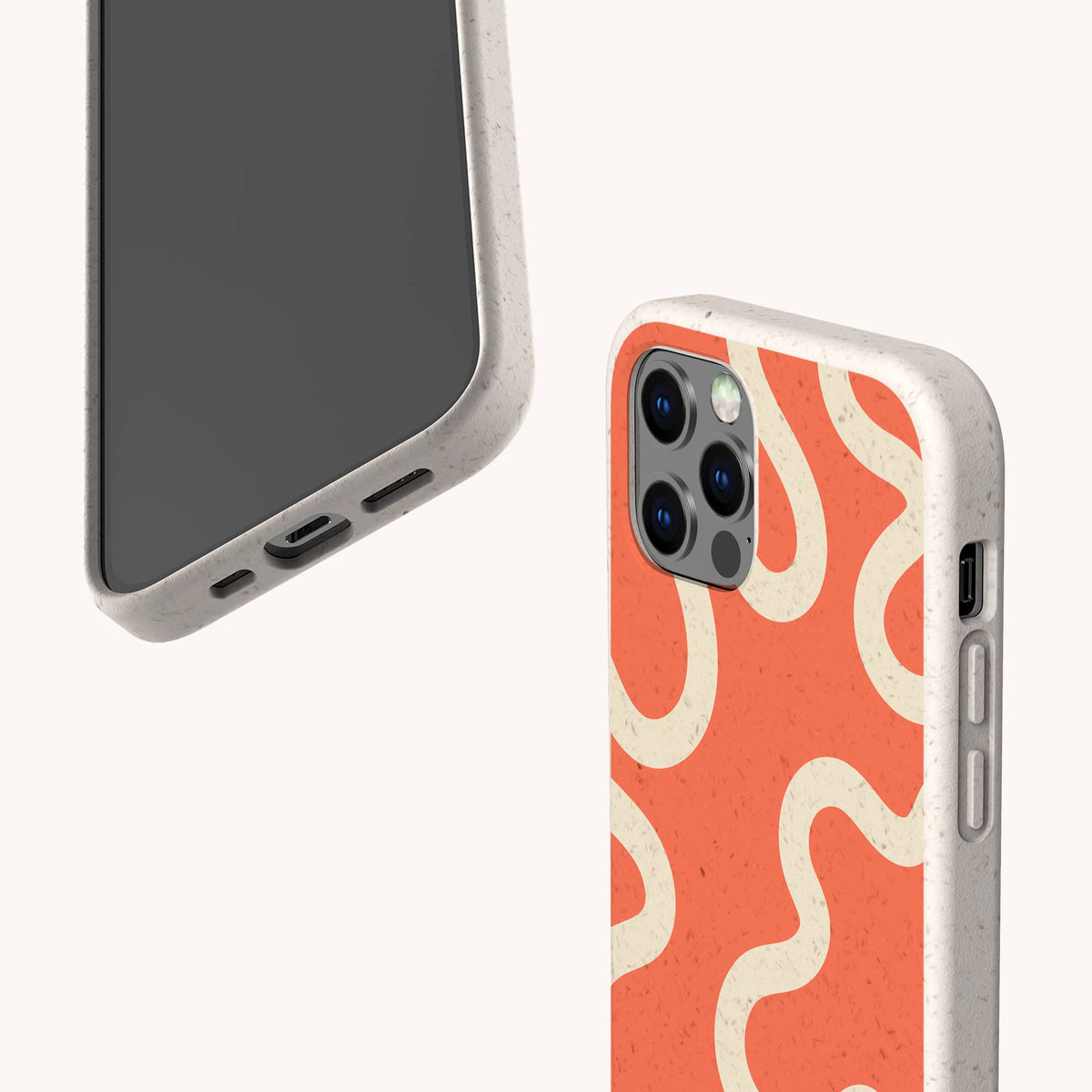 Two smartphones in beige speckled cases, one showcasing the Orange Swirl Eco-Friendly Biodegradable Phone Case with a playful wavy cream and orange pattern, and the other displaying the phone screen and charging port, set against a light background. These eco-friendly biodegradable phone cases offer stylish sustainability for your everyday tech accessories.